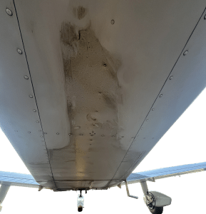 Plane Exhaust Soot and Oil Residue