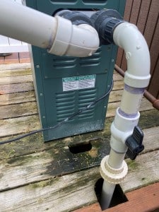Discolored and rotted wood from a leaking pool heater.