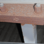 Original photo showing corrosion of internal anchors in 2013.