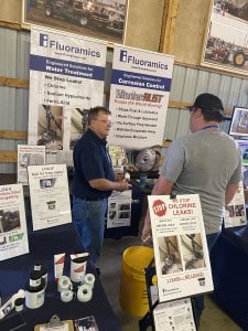 Gregg Reick at trade show booth